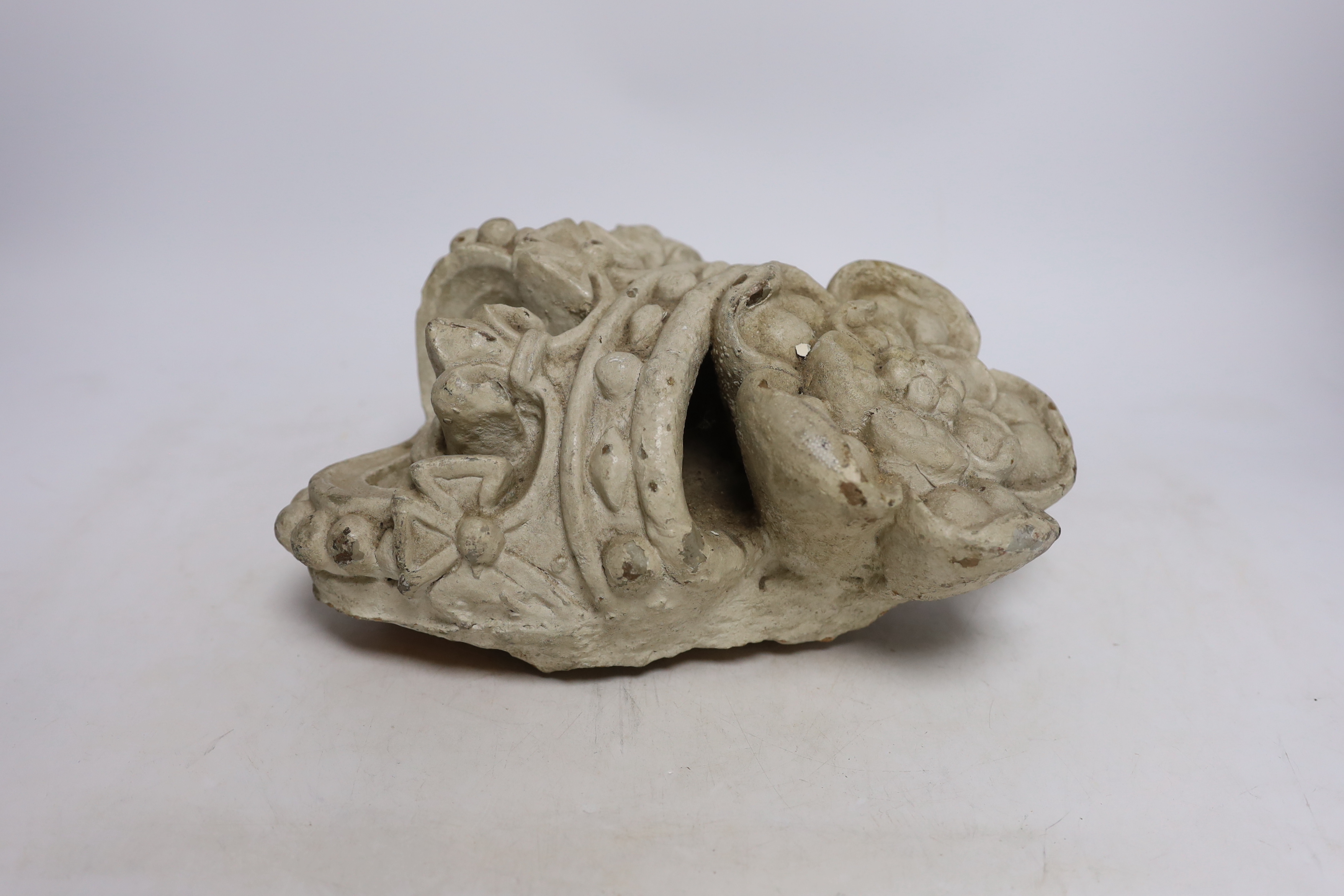 A White painted terracotta architectural cresting in the form coronet over a Tudor rose, 26cm high